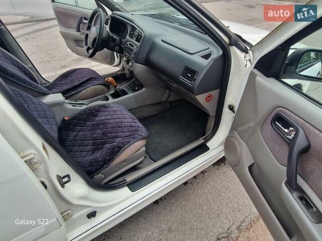 Белый Ниссан Примера, объемом двигателя 1.97 л и пробегом 250 тыс. км за 2600 $, фото 6 на Automoto.ua