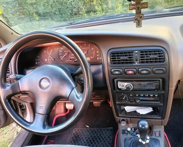 Бежевый Ниссан Примера, объемом двигателя 2 л и пробегом 250 тыс. км за 1600 $, фото 4 на Automoto.ua