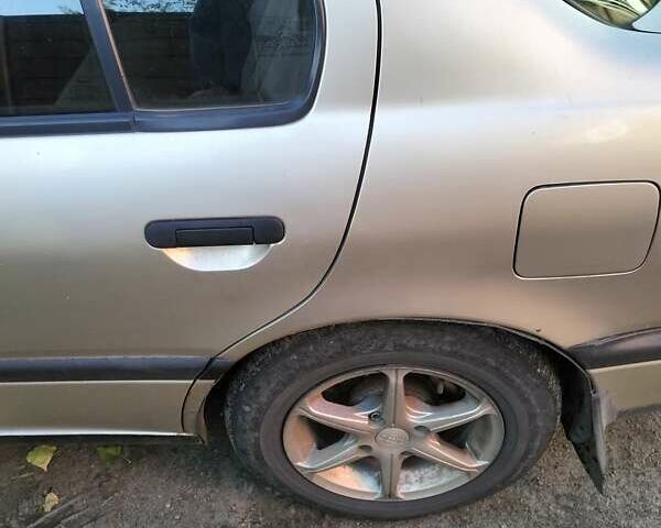 Бежевый Ниссан Примера, объемом двигателя 2 л и пробегом 250 тыс. км за 1600 $, фото 6 на Automoto.ua