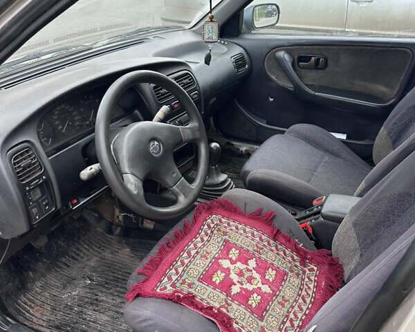 Бежевый Ниссан Примера, объемом двигателя 2 л и пробегом 200 тыс. км за 1500 $, фото 4 на Automoto.ua