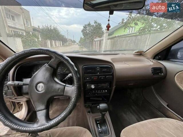 Бежевий Ніссан Прімера, об'ємом двигуна 2 л та пробігом 430 тис. км за 1200 $, фото 6 на Automoto.ua