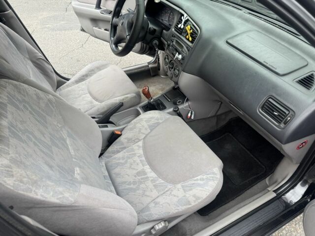 Чорний Ніссан Прімера, об'ємом двигуна 1.6 л та пробігом 207 тис. км за 2199 $, фото 14 на Automoto.ua