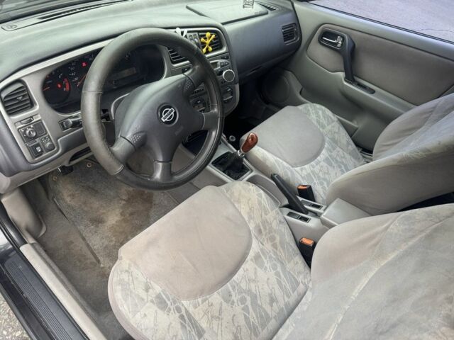 Чорний Ніссан Прімера, об'ємом двигуна 1.6 л та пробігом 207 тис. км за 2199 $, фото 8 на Automoto.ua