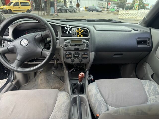 Чорний Ніссан Прімера, об'ємом двигуна 1.6 л та пробігом 207 тис. км за 2199 $, фото 12 на Automoto.ua