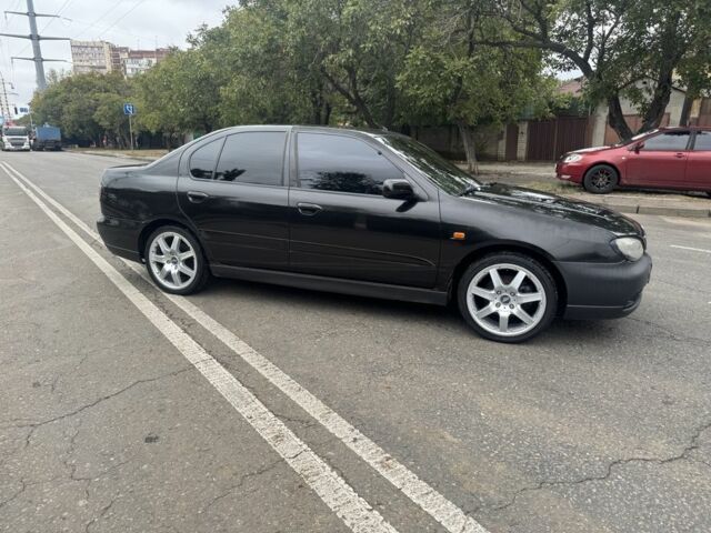 Чорний Ніссан Прімера, об'ємом двигуна 1.6 л та пробігом 207 тис. км за 2199 $, фото 3 на Automoto.ua