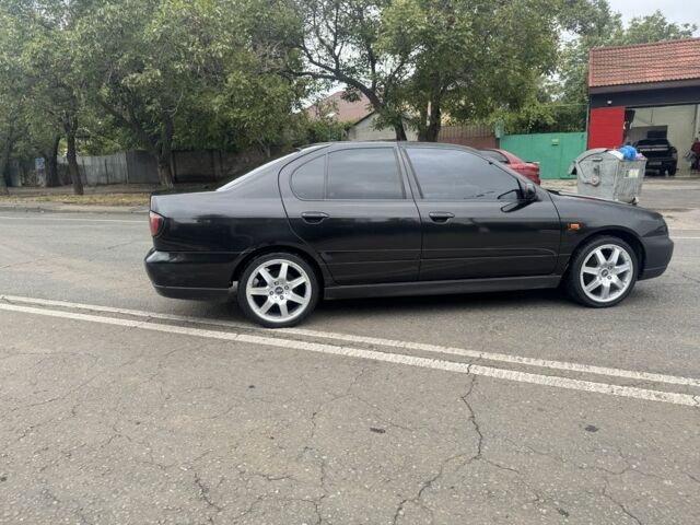 Чорний Ніссан Прімера, об'ємом двигуна 1.6 л та пробігом 207 тис. км за 2199 $, фото 6 на Automoto.ua