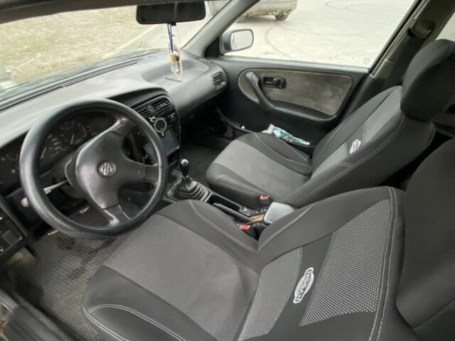 Чорний Ніссан Прімера, об'ємом двигуна 2 л та пробігом 430 тис. км за 1600 $, фото 6 на Automoto.ua