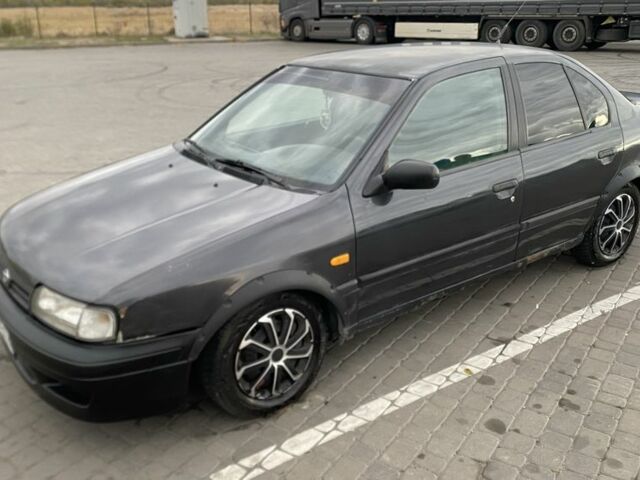 Чорний Ніссан Прімера, об'ємом двигуна 2 л та пробігом 430 тис. км за 1600 $, фото 1 на Automoto.ua