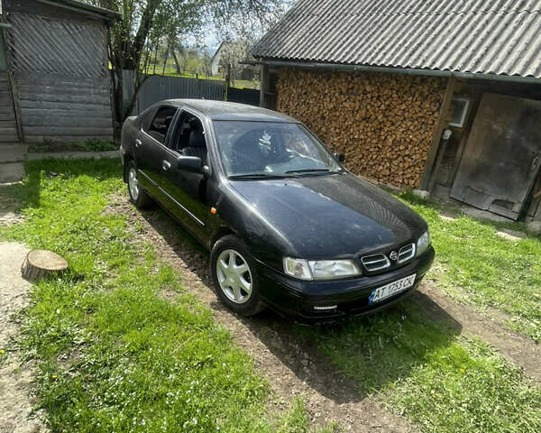 Чорний Ніссан Прімера, об'ємом двигуна 2 л та пробігом 350 тис. км за 2700 $, фото 3 на Automoto.ua