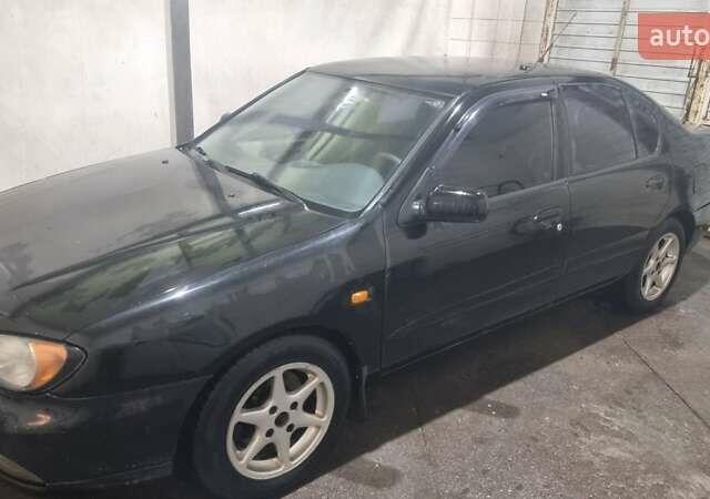 Ниссан Примера 2000 в Киеве на Automoto.ua Черный Ниссан Примера, объемом двигателя 1.8 л и пробегом 335 тыс. км за 1450 $, фото 8 на Automoto.ua