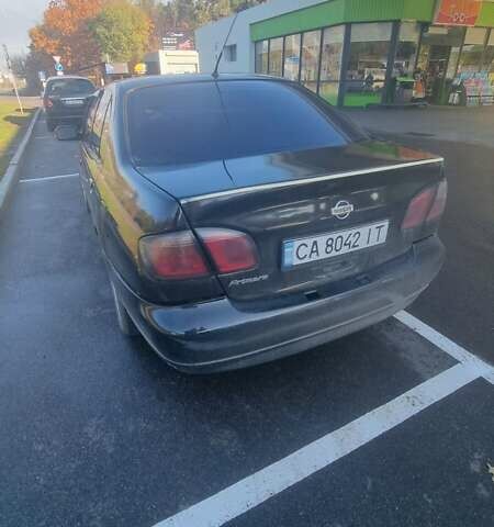 Ниссан Примера 2000 в Киеве на Automoto.ua Черный Ниссан Примера, объемом двигателя 1.8 л и пробегом 335 тыс. км за 1450 $, фото 11 на Automoto.ua
