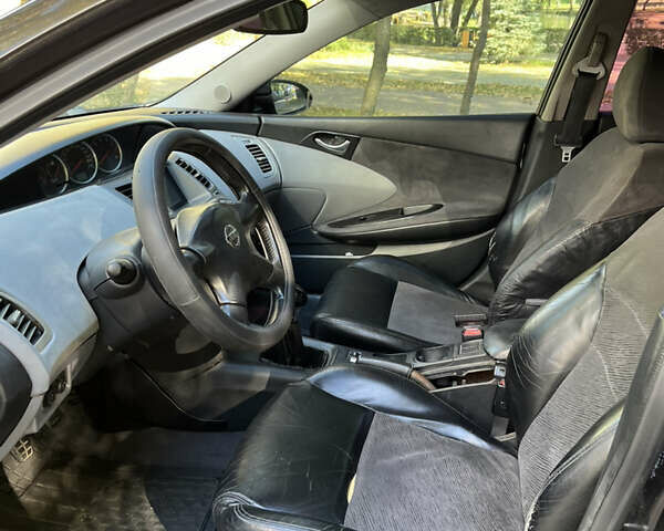 Чорний Ніссан Прімера, об'ємом двигуна 1.8 л та пробігом 270 тис. км за 2500 $, фото 7 на Automoto.ua