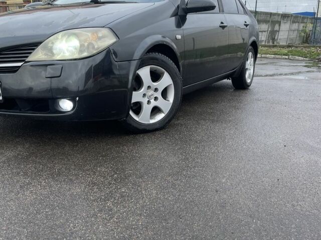 Черный Ниссан Примера, объемом двигателя 2 л и пробегом 297 тыс. км за 3150 $, фото 1 на Automoto.ua