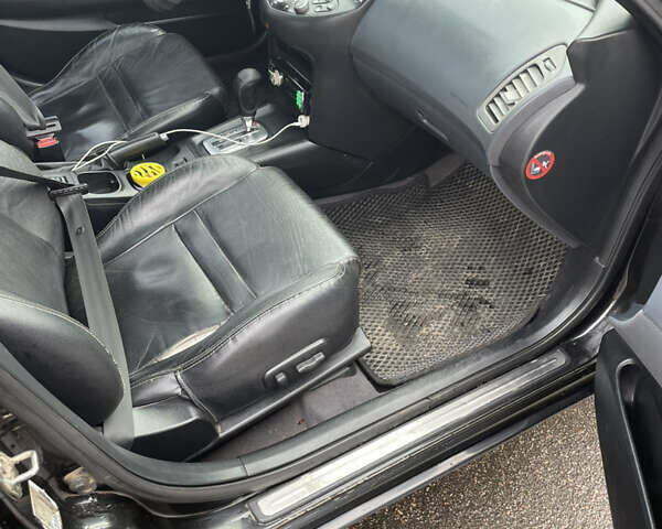 Черный Ниссан Примера, объемом двигателя 2 л и пробегом 297 тыс. км за 3150 $, фото 1 на Automoto.ua