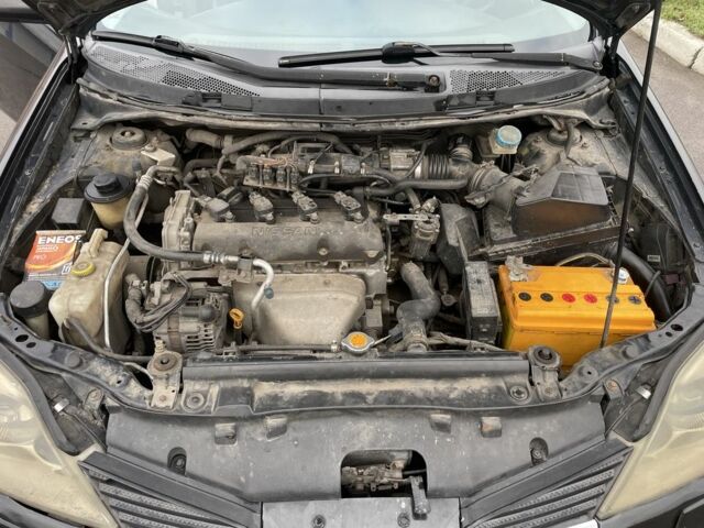 Черный Ниссан Примера, объемом двигателя 2 л и пробегом 297 тыс. км за 3150 $, фото 3 на Automoto.ua