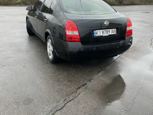 Черный Ниссан Примера, объемом двигателя 2 л и пробегом 297 тыс. км за 3150 $, фото 12 на Automoto.ua