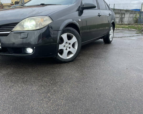 Черный Ниссан Примера, объемом двигателя 2 л и пробегом 295 тыс. км за 2900 $, фото 8 на Automoto.ua