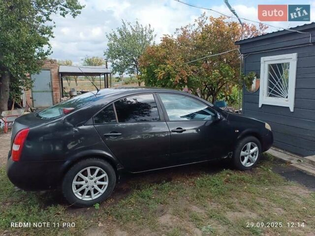 Черный Ниссан Примера, объемом двигателя 1.8 л и пробегом 509 тыс. км за 1500 $, фото 2 на Automoto.ua