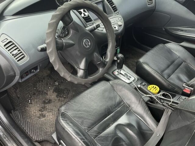 Черный Ниссан Примера, объемом двигателя 2 л и пробегом 297 тыс. км за 3150 $, фото 6 на Automoto.ua