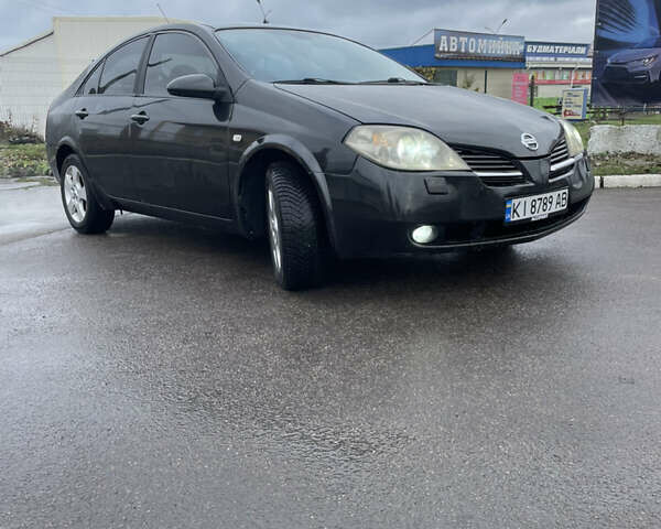 Черный Ниссан Примера, объемом двигателя 2 л и пробегом 297 тыс. км за 3150 $, фото 2 на Automoto.ua