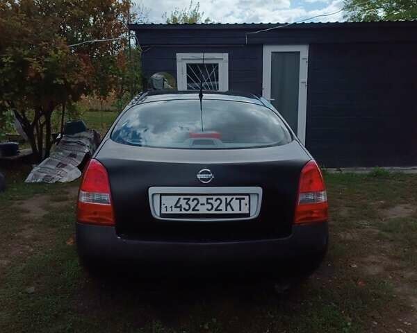 Черный Ниссан Примера, объемом двигателя 1.8 л и пробегом 509 тыс. км за 1500 $, фото 4 на Automoto.ua