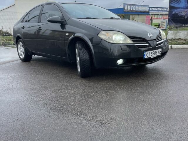 Черный Ниссан Примера, объемом двигателя 2 л и пробегом 297 тыс. км за 3150 $, фото 10 на Automoto.ua