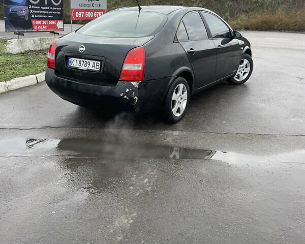 Черный Ниссан Примера, объемом двигателя 2 л и пробегом 295 тыс. км за 2900 $, фото 1 на Automoto.ua