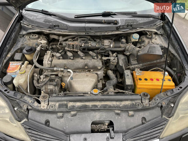 Черный Ниссан Примера, объемом двигателя 2 л и пробегом 297 тыс. км за 3150 $, фото 12 на Automoto.ua