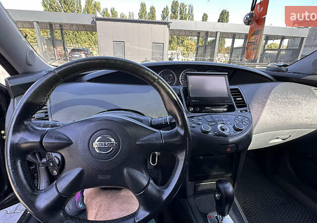 Черный Ниссан Примера, объемом двигателя 2 л и пробегом 244 тыс. км за 4999 $, фото 14 на Automoto.ua