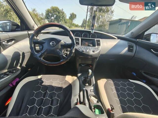 Черный Ниссан Примера, объемом двигателя 1.6 л и пробегом 355 тыс. км за 3500 $, фото 6 на Automoto.ua