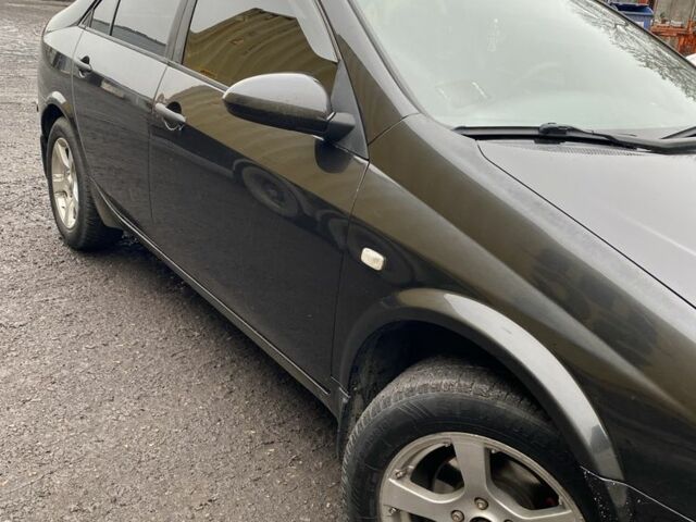 Черный Ниссан Примера, объемом двигателя 2 л и пробегом 150 тыс. км за 4300 $, фото 2 на Automoto.ua