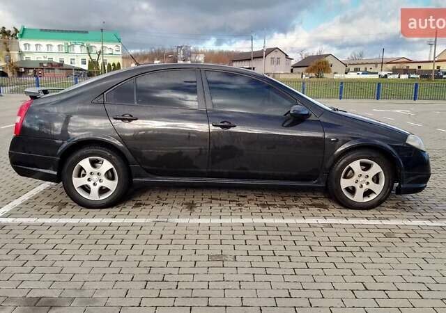 Черный Ниссан Примера, объемом двигателя 2.02 л и пробегом 328 тыс. км за 3600 $, фото 1 на Automoto.ua