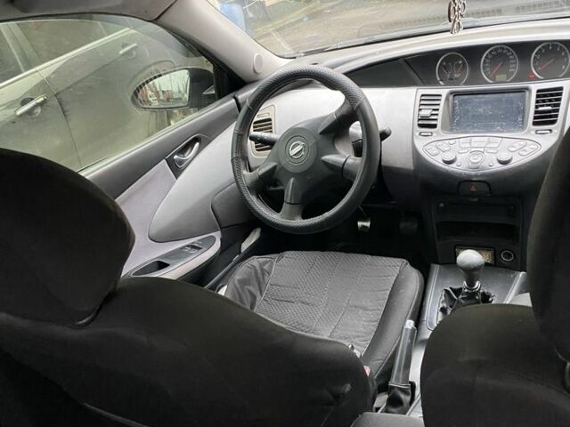 Черный Ниссан Примера, объемом двигателя 2 л и пробегом 150 тыс. км за 4300 $, фото 4 на Automoto.ua