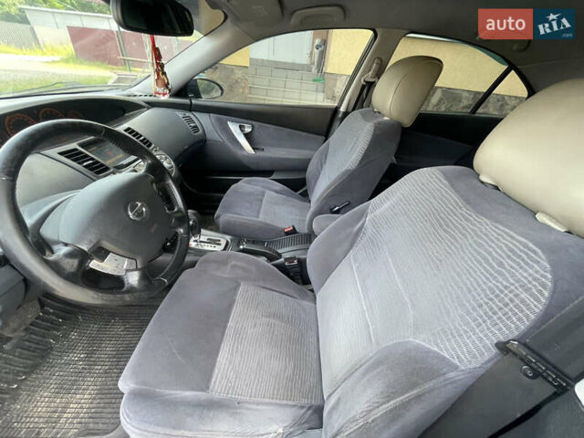 Черный Ниссан Примера, объемом двигателя 2 л и пробегом 187 тыс. км за 3600 $, фото 11 на Automoto.ua