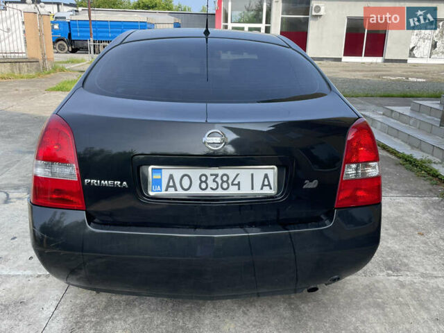 Черный Ниссан Примера, объемом двигателя 2 л и пробегом 187 тыс. км за 3600 $, фото 4 на Automoto.ua