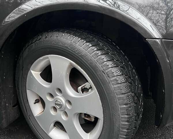 Черный Ниссан Примера, объемом двигателя 2 л и пробегом 188 тыс. км за 4290 $, фото 13 на Automoto.ua