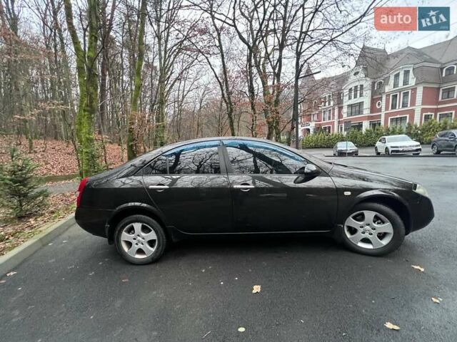 Черный Ниссан Примера, объемом двигателя 2 л и пробегом 188 тыс. км за 4290 $, фото 3 на Automoto.ua