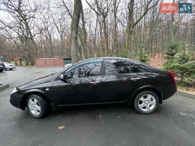 Черный Ниссан Примера, объемом двигателя 2 л и пробегом 188 тыс. км за 4290 $, фото 4 на Automoto.ua