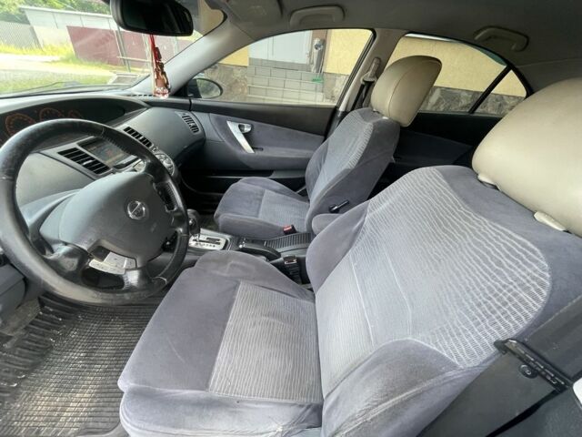 Черный Ниссан Примера, объемом двигателя 2 л и пробегом 186 тыс. км за 3500 $, фото 17 на Automoto.ua