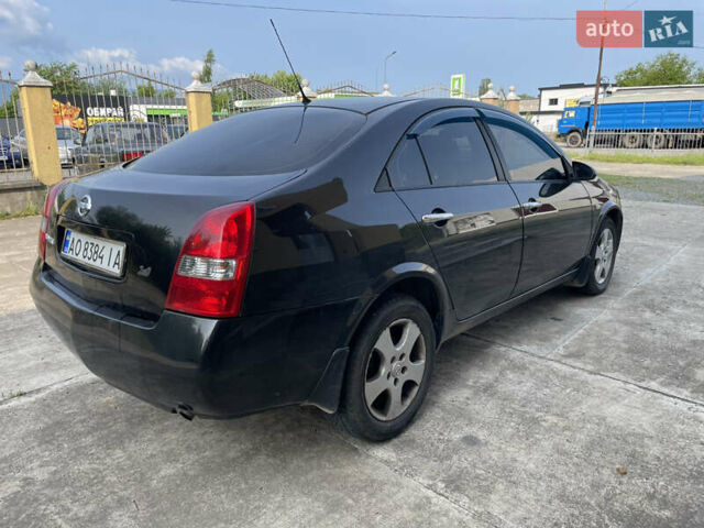 Черный Ниссан Примера, объемом двигателя 2 л и пробегом 187 тыс. км за 3600 $, фото 3 на Automoto.ua