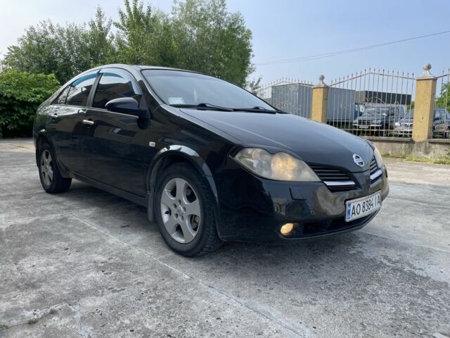Черный Ниссан Примера, объемом двигателя 2 л и пробегом 186 тыс. км за 3500 $, фото 1 на Automoto.ua