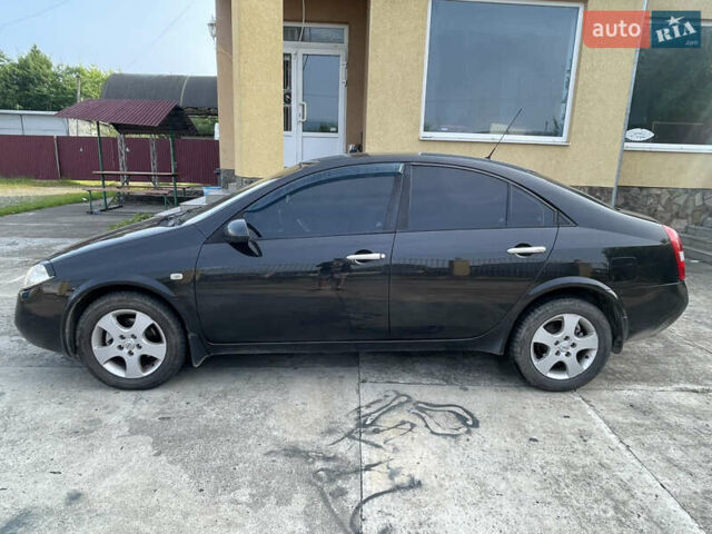 Черный Ниссан Примера, объемом двигателя 2 л и пробегом 187 тыс. км за 3600 $, фото 6 на Automoto.ua