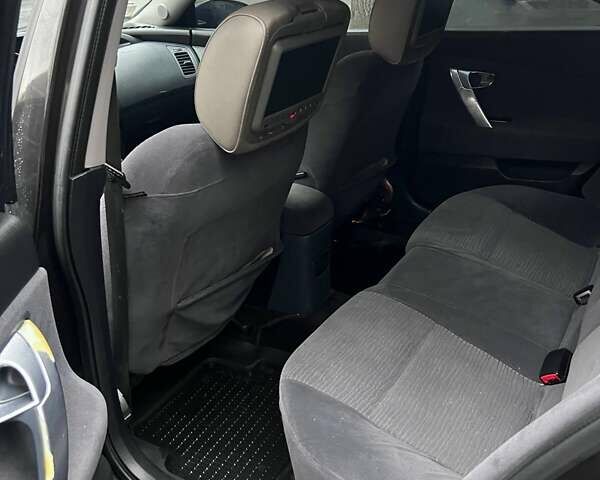 Черный Ниссан Примера, объемом двигателя 2 л и пробегом 188 тыс. км за 4290 $, фото 11 на Automoto.ua