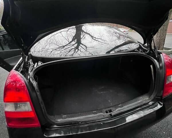 Черный Ниссан Примера, объемом двигателя 2 л и пробегом 188 тыс. км за 4290 $, фото 12 на Automoto.ua