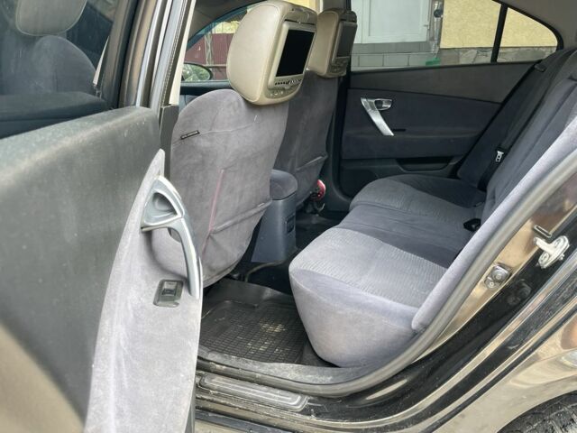 Черный Ниссан Примера, объемом двигателя 2 л и пробегом 186 тыс. км за 3500 $, фото 10 на Automoto.ua