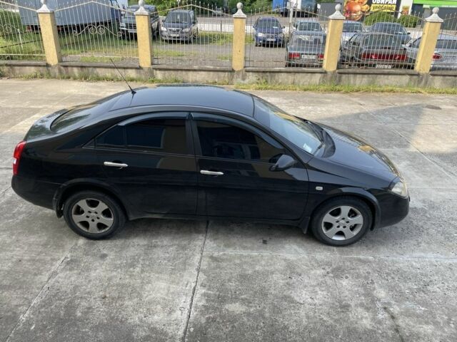 Черный Ниссан Примера, объемом двигателя 2 л и пробегом 186 тыс. км за 3500 $, фото 2 на Automoto.ua