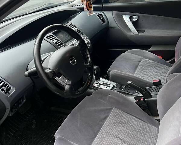 Черный Ниссан Примера, объемом двигателя 2 л и пробегом 188 тыс. км за 4290 $, фото 10 на Automoto.ua