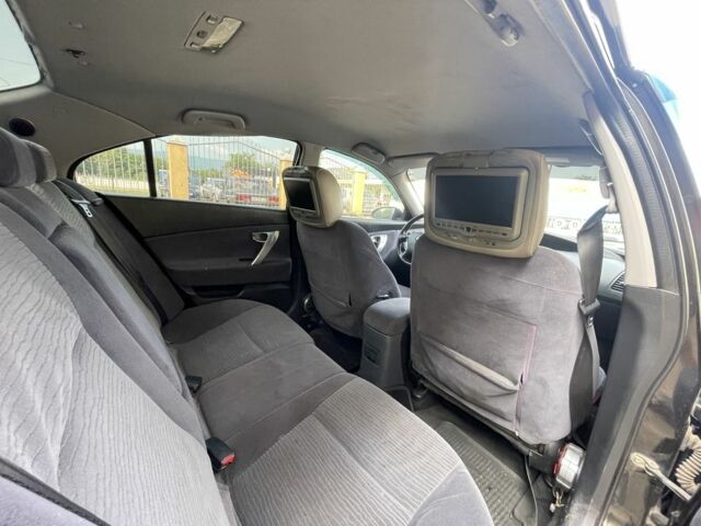 Черный Ниссан Примера, объемом двигателя 2 л и пробегом 186 тыс. км за 3500 $, фото 13 на Automoto.ua