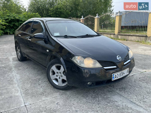 Черный Ниссан Примера, объемом двигателя 2 л и пробегом 187 тыс. км за 3600 $, фото 1 на Automoto.ua