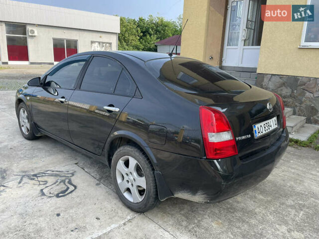 Черный Ниссан Примера, объемом двигателя 2 л и пробегом 187 тыс. км за 3600 $, фото 5 на Automoto.ua